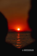 Sunset Through the Rock — Greek Islands
