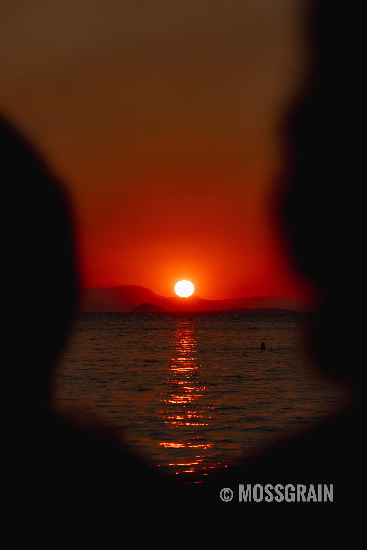 Sunset Through the Rock — Greek Islands